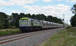 250 006 der Captrain schleppte am 30.06.18 einen Schotterzug aus Mühlberg/Elbe kommend durch Jütrichau Richtung Magdeburg.