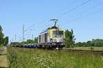 Captrain Deutschland 248 035, vermietet an ITL, mit Flachwagen in Richtung Osnabrück (bei Lembruch, 03.06.2023).