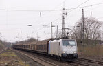 186 457 mit einem Ganzzug aus Schiebewandwagen auf dem Weg nach Dortmund-Obereving, aufgenommen in Essen-Altenessen.