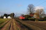 145 005 mit einem Röhrenzug am 23.02.18 bei Probsthagen.