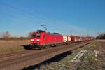 DB Cargo 185 094-0 mit einen Mischer am 14.02.21 in Wolfskehlen