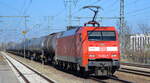 DB Cargo AG [D] mit  152 155-8  [NVR-Nummer: 91 80 6152 155-8 D-DB] und Kesselwagenzug (Benzin) am 28.02.22 Durchfahrt Bf.