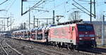 DB Cargo AG [D] mit ihrer  189 007-8  [NVR-Nummer: 91 80 6189 007-8 D-DB] und einem PKW-Transportzug Richtung Frankfurt/Oder am 01.03.23 Durchfahrt Bahnhof Flughafen BER Terminal 5