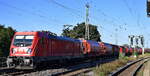 DB Cargo AG, Mainz mit ihrer  187 115  (NVR:  91 80 6187 115-1 D-DB ) und einem Kalisalz-Transportzug am 07.09.23 Vorbeifahrt Bahnhof Magdeburg-Neustadt.