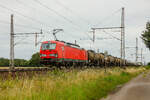 193 313 DB Vectron mit Kesselzug in Dedensen Gümmer, Juli 2024.