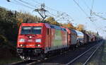 DB Cargo AG, Mainz mit ihrer  185 205-2  [NVR-Nummer: 91 80 6185 205-2 D-DB] und einem gemischten Güterzug am 25.10.24 Höhe Bahnhof Berlin-Hohenschönhausen.