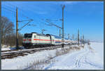 Mit dem IC 2440 nach Kln eilt 146 556-6 von DB Fernverkehr am 14.02.2021 durch die winterliche Landschaft bei Wellen.