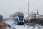 Ein UBB 646er als UBB 24016 von Stralsund nach Barth am 19.12.2009 zwischen Hbf Stralsund und Hp Grnhufe.