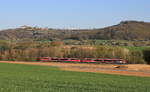 642 233+xxx als RE Heilbronn-Crailsheim am 11.04.2020 unter der Stadtkulisse von Waldenburg.