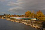 223 071-2 verlsst mit ihrem Alex ber den Bahndamm Lindau Bhf gen Allgu.