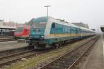 Arriva Lok 223 065 mit einem Zug nach Mnchen Hbf.am 17.01.11 im nebligen Lindauer Hbf.