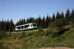 654 031 (VT31  Stadt Klingenthal ) als VBG20814 Graslitz - Zwickau im obervogtlndischen Wald zwischen Schneck und Muldenberg, 27.7.011.