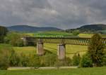 650 652 (VT 17) + 650 655 (VT 20) + 650 654 (VT 19) + 650 661 (VT 26) als WBA1 nach Bayerisch Eisenstein am 10.05.2014 auf der Ohebrücke bei Regen.