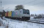 Sie lsst mich nicht los: 185 672-3 mit Containerzug in Fahrtrichtung Sden am 03.02.2010 bei Cornberg.