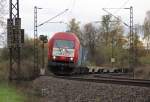 Frontal: 223 031 (420 11) der EVB/MWB mit Containerzug in Fahrtrichtung Norden.