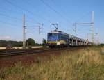 140 866-5 der EVB/MWB mit Autotransportzug aus Richtung Seelze kommend.