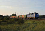 EGP mit der 140 876-4 zieht einen Containerzug in Richtung Schwerin.