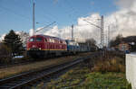 EGP 225 094 & 218 153 am 07.12.2022 mit einem Leerdüngerzug im Bf Lancken.