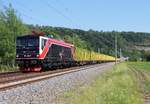 155 239-7 (EBS) zu sehen mit einem leeren Holzzug am 11.06.23 in Schöps.