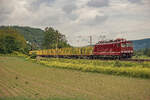 155 195 im Dienste des Erfurter Bahnservice fuhr am 18.05.2024 mit einem Holzwagenzug durch Porstendorf in Richtung Jena und bestimmt weiter nach Saalfeld.