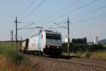 ERS BR 185.635 mit einem Containerzug in Haiding am 25.7.2013