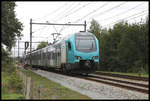 Direkt an der deutsch holländischen Grenze ist hier im niederländischen De Lutte der Eurobahn ET 4.04 am 3.9.2019 um 14.21 Uhr nach Hengelo unterwegs.