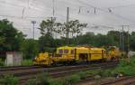 Eine 08-275 UNIMAT 3S und eine Deutsche Plasser SSP 110 SW der eurogleis gmbh, am 30.07.2014 in Magdeburg Hbf.