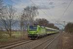 Eine Vectron zieht den FLX 30 durch Bönen-Nordbögge (31.12.2021)