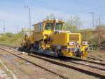 Schotterplaniermaschine SSP 110 SW (97 16 46 511 18 - 0) am 17. April 2014 auf dem befahrbaren Teil des Bahnhof Berlin Grünau.  