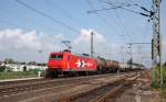 145-CL 011, als 2001 in Diensten des Hfen und Gterverkehr Kln(HGK), durchfhrt am 30.06.2009 mit einem Kesselwagenzug den Bahnhof Delitzsch in Richtung Leipzig.