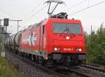 185 585-7 der HGK mit einem Kesselzug ; aufgenommen in Porz Wahn am 13.08.09 