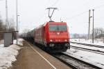 HGK 2063 (185 605-3) mit Kesselwagen am 23.02.2010 durch Passow (Uckermark)