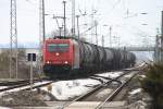 HGK 2061 (185 603-8) mit Kesselwagenzug am 23.02.2010 durch Passow nach Stendell