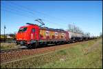 HGK 185 586-5 mit einem Kesselwagenumleiter von Stendell in Richtung Rostock am 18.04.2009, hier zwischen Hbf Stralsund und Hp Grnhufe.