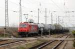 HGK 2067 (185 632-7) mit Kesselwagenzug nach Stendell am 09.04.2010 durch Passow