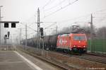 185 630-1 (HGK 2065) von der HGK Hfen - Und Gterverkehr Kln mit Kesselzug in Rathenow in Richtung Wustermark unterwegs. 14.03.2011