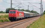 185 606 der HGK fuhr am 05.06.11 mit dem Kirchentagssonderzug nach Aachen durch Wurzen Richtung Leipzig.