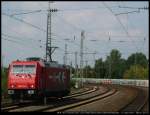 HGK 185 631 passiert als Lz die S-Bahn Station Kln Geldernstr/Parkgrtel (31.08.2011)