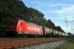 Macquarie European Rail 185 584, vermietet an HGK (2052), mit Kesselwagenzug in Richtung Bremen in Diepholz, 24.09.11.