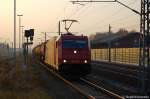 185 606-1 (HGK 2064) der HGK - Hfen und Gterverkehr Kln AG mit einem Kesselzug fr Umweltgefhrdenden Stoffen in flssiger Form in Rathenow Richtung Wustermark unterwegs. 07.11.2011