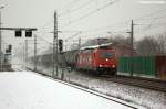 185 587-3 HGK - Hfen und Gterverkehr Kln AG [HGK 2055] mit einem Kesselzug  Benzin oder Ottokraftstoffe  in Rathenow und fuhr in Richtung Wustermark weiter.