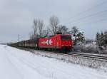 Die 145-CL 012 mit einem Schiebewandwagenzug am 19.01.2013 unterwegs bei Langenisarhofen.