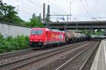 185 603 der HGK mit einem Kesselzug im Bahnhof Hamburg-Harburg.Aufgenommen am 25.6.2013