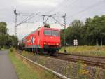 HGK 145-CL 011 mit Kesselwagenzug in Fahrtrichtung Norden.