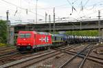 HGK 185 605-3 und Class 66 mit einem Kesselzug am 07.05.2014 in Hamburg Harburg.