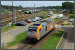 246 010-3 der HVLE hat am 22.06.2024 den Platz vor dem Lokschuppen verlassen, um an der im Bild zu sehenden Tankstelle im Rbf Wustermark ihren Durst zu stillen.