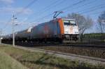 185 583-2 der Havellndische Eisenbahn AG (hvle) mit einem Kesselzug zwischen Growudicke und Rathenow in Richtung Stendal. 16.04.2010