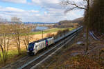 159 204 RCM/HHPI mit einem leeren Holzzug bei Etterzhausen Richtung Nürnberg, 20.03.2021