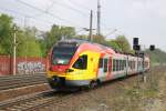 Dreiteiliger Flirt (427 043/543) der Hessischen Landesbahn fr ODEG als RE 4 am 08.05.2013 in Rathenow