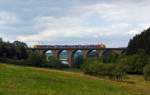 Ein 5-teiliger Flirt der HLB (Hessischen Landesbahn) als RE 99 Main-Sieg-Express (Frankfurt am Main-Gieen-Siegen) hier Umlauf HLB 24966, fhrt am 20.08.2013 ber den Rudersdorfer Viadukt in Richtung